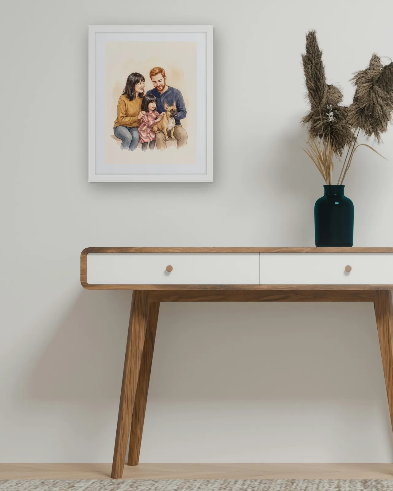 The finished portrait in a white frame, hanging above a console